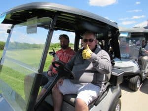 golfers in golf cart2