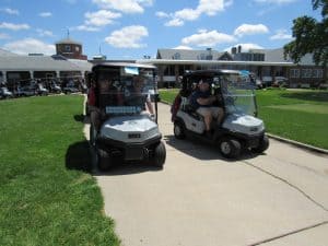 golfers in golf carts4