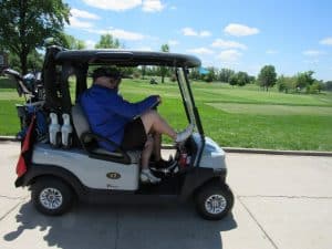 golfers in golf cart5