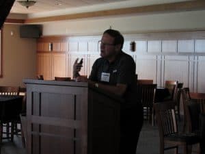 Tim Runnalls addressing Golfers at MIB golf event